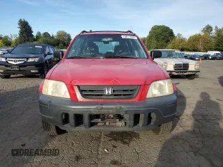 2000 Honda CR-V LX with VIN JHLRD1846YC036376, listed as a Copart auction lot 74011674 with 152,002 mi miles and Salvage Title. Bid and sale history available at carsss.com. Image 5.