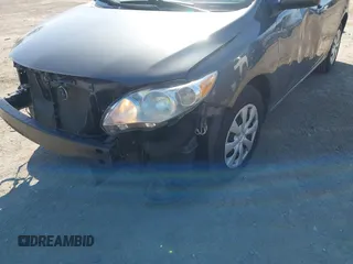 2011 Toyota Corolla L with VIN 2T1BU4EE1BC674644, listed as a IAAI auction lot 41876165 with 128,830 mi miles. Bid and sale history available at carsss.com. Image 6.