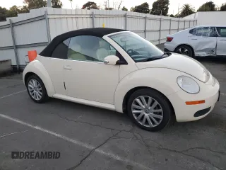 2009 Volkswagen Beetle S with VIN 3VWRF31Y29M409328, listed as a Copart auction lot 87849455 with 69,693 mi miles and Salvage title. Bid and sale history available at DreamBid. Image 4.