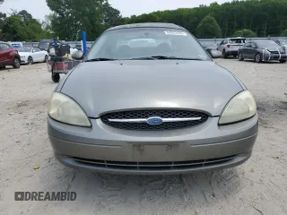 2002 Ford Taurus SES Standard with VIN 1FAFP55U42A184084, listed as a Copart auction lot 59822495 with 124,835 mi miles and Salvage title. Bid and sale history available at DreamBid. Image 5.
