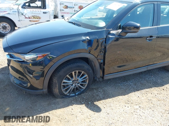 2020 Mazda CX-5 Sport with VIN JM3KFABM2L0761184, listed as a IAAI auction lot 41847768 with 47,582 mi miles. Bid and sale history available at carsss.com. Image 6.