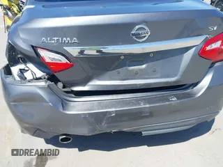 2017 Nissan Altima S z VIN 1N4AL3AP4HC271765, wystawiony jako IAAI lot #41968905 z przebiegiem 106 621 mil mil oraz . Historia ofert i sprzedaży dostępna na DreamBid. Obrazek 6.