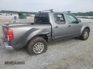 2016 Nissan Frontier SV with VIN 1N6AD0ER1GN904465, listed as a Copart auction lot 57233355 with 167,433 mi miles and Salvage title. Bid and sale history available at DreamBid. Image 3.