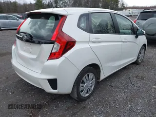 2017 Honda Fit LX with VIN JHMGK5H58HS021117, listed as a IAAI auction lot 42026243 with 94,953 mi miles. Bid and sale history available at carsss.com. Image 4.