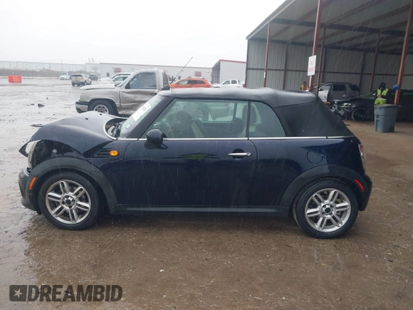 2013 MINI Convertible with VIN WMWZN3C53DT135492, listed as a IAAI auction lot 41436703 with 79,408 mi miles and . Bid and sale history available at DreamBid. Image 14.