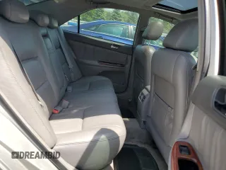2006 Toyota Camry LE z VIN 4T1BF30K16U630147, wystawiony jako Copart lot #59696815 z przebiegiem 168 727 mil mil oraz Czysty tytuł • Clean title. Historia ofert i sprzedaży dostępna na DreamBid. Obrazek 10.