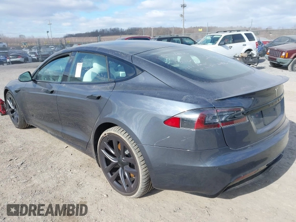 2021 Tesla Model S Plaid with VIN 5YJSA1E60MF455768, listed as a IAAI auction lot 41603504 with 27,398 mi miles. Bid and sale history available at carsss.com. Image 3.