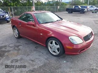 2000 Mercedes-Benz SLK 230 Kompressor with VIN WDBKK47F2YF146797, listed as a IAAI auction lot 42823113 with 35,881 mi miles and . Bid and sale history available at DreamBid. Image 1.