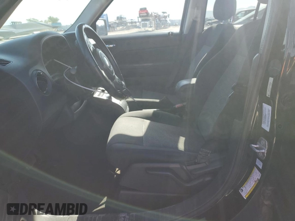 2014 Jeep Patriot Latitude with VIN 1C4NJRFB5ED855888, listed as a Copart auction lot 57969355 with 113,196 mi miles and Salvage title. Bid and sale history available at DreamBid. Image 7.