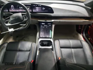 2022 Lucid Air Grand Touring z VIN 50EA1GBA0NA001260, wystawiony jako Copart lot #52131155 z przebiegiem 25 673 mil mil oraz Szkody całkowita. Historia ofert i sprzedaży dostępna na DreamBid. Obrazek 8.