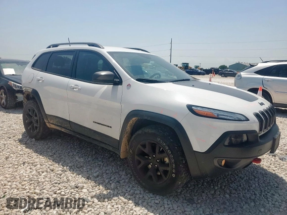 2016 Jeep Cherokee Trailhawk z VIN 1C4PJMBS3GW189266, wystawiony jako Copart lot #56891615 z przebiegiem 94 172 mil mil oraz Szkoda całkowita • Salvage title. Historia ofert i sprzedaży dostępna na DreamBid. Obrazek 4.