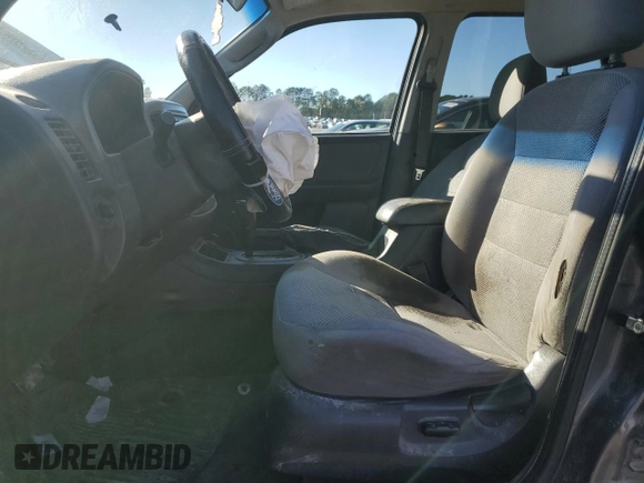 2005 Ford Escape XLT with VIN 1FMCU93105KA96729, listed as a Copart auction lot 75553354 with 220,081 mi miles and Salvage Title. Bid and sale history available at DreamBid. Image 7.