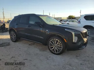 2024 Cadillac XT4 FWD Sport with VIN 1GYFZER47RF101186, listed as a Copart auction lot 79128454 with 10,499 mi miles and Salvage title. Bid and sale history available at DreamBid. Image 4.