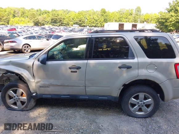 2008 Ford Escape XLT with VIN 1FMCU93198KE17879, listed as a IAAI auction lot 40125825 with 214,373 mi miles and . Bid and sale history available at DreamBid. Image 15.