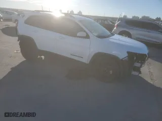 2019 Jeep Cherokee Altitude with VIN 1C4PJLLX5KD381586, listed as a Copart auction lot 48246495 with 82,851 mi miles and Salvage Title. Bid and sale history available at carsss.com. Image 4.