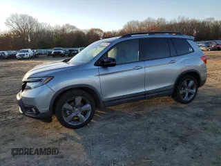 2019 Honda Passport Touring z VIN 5FNYF7H96KB000389, wystawiony jako Copart lot #85587514 z przebiegiem 62 463 mil mil oraz Szkody całkowita. Historia ofert i sprzedaży dostępna na DreamBid. Obrazek 1.