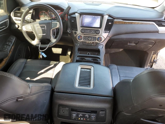 2016 GMC Yukon Denali with VIN 1GKS2CKJ9GR301628, listed as a Copart auction lot 48937035 with 121,863 mi miles and Salvage Title. Bid and sale history available at carsss.com. Image 8.