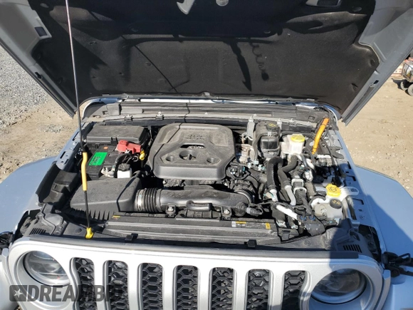 2023 Jeep Wrangler Sahara z VIN 1C4JJXP66PW703050, wystawiony jako Copart lot #53637455 z przebiegiem 7 525 mil mil oraz Czysty tytuł • Clean title. Historia ofert i sprzedaży dostępna na DreamBid. Obrazek 11.