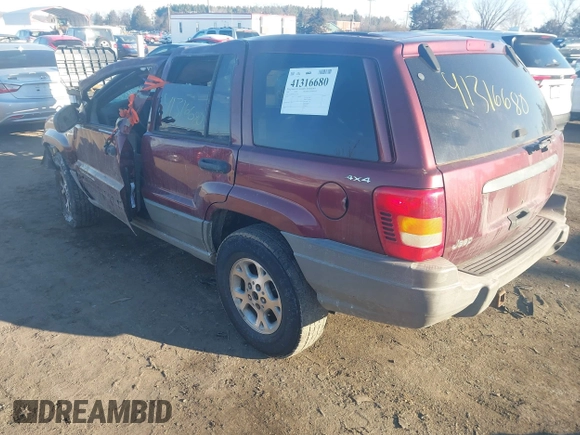 2000 Jeep Grand Cherokee Laredo with VIN 1J4GW48N3YC231743, listed as a IAAI auction lot 41316680 with Not provided miles and . Bid and sale history available at DreamBid. Image 3.