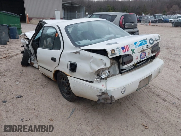 1997 Geo Prizm LSi with VIN 1Y1SK5266VZ417087, listed as a IAAI auction lot 42009913 with 198,041 mi miles. Bid and sale history available at carsss.com. Image 3.