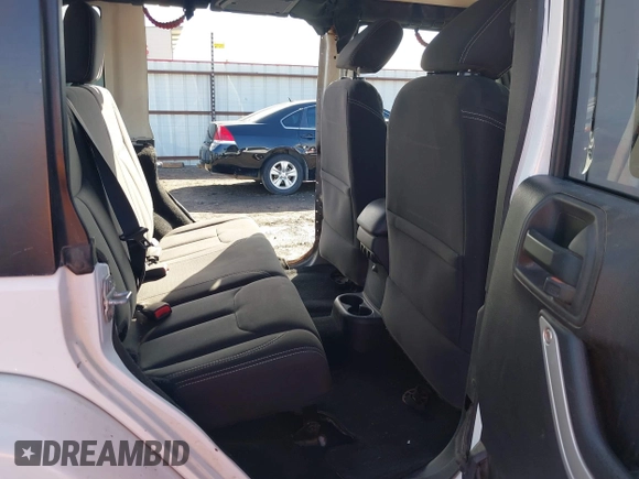 2017 Jeep Wrangler Unlimited Sahara with VIN 1C4BJWEG2HL552382, listed as a IAAI auction lot 41631092 with 96,097 mi miles and . Bid and sale history available at DreamBid. Image 8.