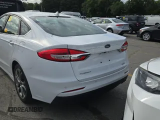 2020 Ford Fusion SEL with VIN 3FA6P0CD1LR154201, listed as a IAAI auction lot 42715761 with 99,448 mi miles and . Bid and sale history available at DreamBid. Image 49.