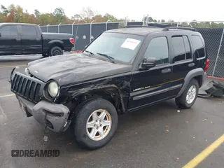 2003 Jeep Liberty Sport with VIN 1J4GK48KX3W656837, listed as a IAAI auction lot 40785615 with 164,450 mi miles and . Bid and sale history available at DreamBid. Image 2.