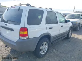 2001 Ford Escape XLT with VIN 1FMYU04151KF69759, listed as a IAAI auction lot 41997906 with 182,133 mi miles. Bid and sale history available at carsss.com. Image 4.