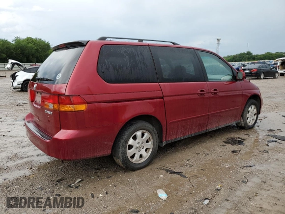 2003 Honda Odyssey EX with VIN 5FNRL18643B129670, listed as a Copart auction lot 85890784 with 222,216 mi miles and Salvage Title. Bid and sale history available at DreamBid. Image 3.