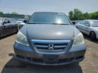 2007 Honda Odyssey LX z VIN 5FNRL38257B011710, wystawiony jako Copart lot #61163265 z przebiegiem 196 575 mil mil oraz Czysty tytuł • Clean title. Historia ofert i sprzedaży dostępna na DreamBid. Obrazek 5.