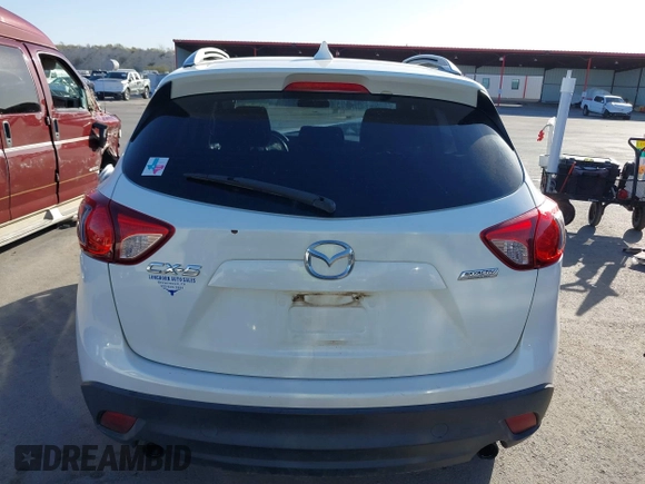 2015 Mazda CX-5 Sport with VIN JM3KE2BE3F0449722, listed as a IAAI auction lot 41825810 with 181,949 mi miles and . Bid and sale history available at DreamBid. Image 17.