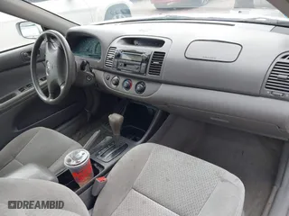 2003 Toyota Camry LE with VIN 4T1BE32K13U784854, listed as a IAAI auction lot 42039285 with 208,776 mi miles. Bid and sale history available at carsss.com. Image 5.