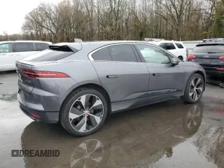 2019 Jaguar I-Pace HSE z VIN SADHD2S19K1F69913, wystawiony jako Copart lot #77481363 z przebiegiem 82 497 mil mil oraz . Historia ofert i sprzedaży dostępna na DreamBid. Obrazek 3.