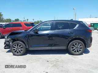 2017 Mazda CX-5 Grand Touring with VIN JM3KFBDL6H0200830, listed as a IAAI auction lot 42005145 with 90,510 mi miles. Bid and sale history available at carsss.com. Image 14.