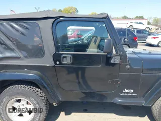 2005 Jeep Wrangler X with VIN 1J4FA39S35P372731, listed as a IAAI auction lot 41875121 with 146,034 mi miles and . Bid and sale history available at DreamBid. Image 13.
