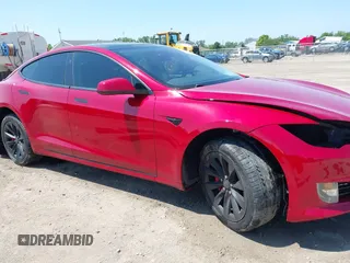 2017 Tesla Model S 100D with VIN 5YJSA1E46HF183568, listed as a IAAI auction lot 42626561 with 110,606 mi miles and . Bid and sale history available at DreamBid. Image 14.