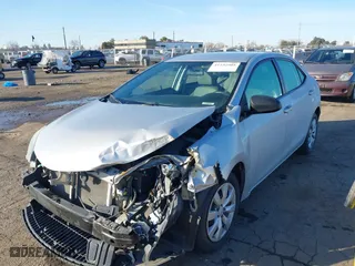 2015 Toyota Corolla L with VIN 5YFBURHE7FP297140, listed as a IAAI auction lot 41532905 with 64,004 mi miles. Bid and sale history available at carsss.com. Image 18.
