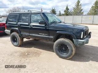 2000 Jeep Cherokee z VIN 1J4FF48S7YL153811, wystawiony jako IAAI lot #42098752 z przebiegiem 213 988 mil mil oraz . Historia ofert i sprzedaży dostępna na DreamBid. Obrazek 1.