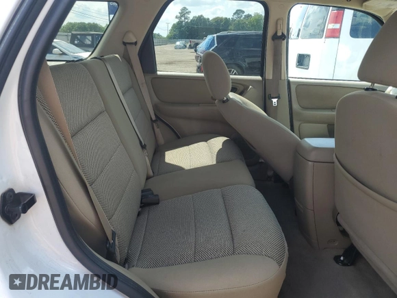 2005 Ford Escape XLT z VIN 1FMYU93145DA04306, wystawiony jako Copart lot #56209425 z przebiegiem 124 956 mil mil oraz Szkoda całkowita • Salvage title. Historia ofert i sprzedaży dostępna na DreamBid. Obrazek 11.