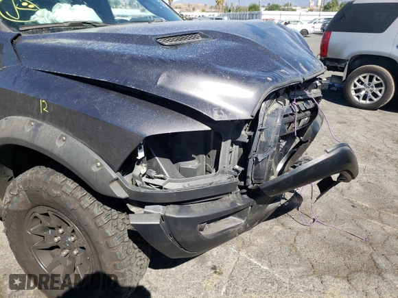 2018 Ram 1500 Rebel with VIN 1C6RR7YT1JS161619, listed as a Copart auction lot 60226061 with 49,567 mi miles and Salvage Title. Bid and sale history available at carsss.com. Image 9.
