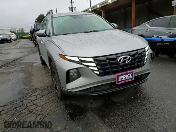 2023 Hyundai Tucson SEL z VIN 5NMJBCAE1PH195028, wystawiony jako Copart lot #53737085 z przebiegiem 61 640 mil mil oraz Szkoda całkowita • Salvage title. Historia ofert i sprzedaży dostępna na DreamBid. Obrazek 11.