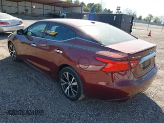 2016 Nissan Maxima Platinum z VIN 1N4AA6AP1GC416590, wystawiony jako IAAI lot #41817288 z przebiegiem 248 514 mil mil oraz . Historia ofert i sprzedaży dostępna na DreamBid. Obrazek 3.