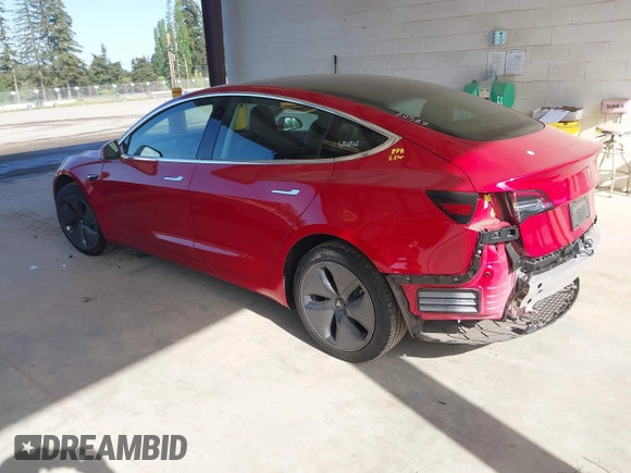 2020 Tesla Model 3 Standard Range Plus z VIN 5YJ3E1EA7LF611669, wystawiony jako IAAI lot #42179974 z przebiegiem 17 696 mil mil oraz . Historia ofert i sprzedaży dostępna na DreamBid. Obrazek 3.