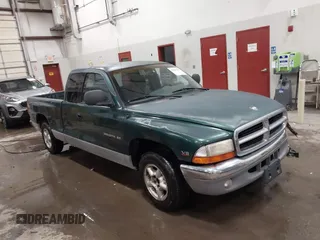 1998 Dodge Dakota SLT with VIN 1B7GL22X9WS580132, listed as a IAAI auction lot 41623943 with 232,137 mi miles. Bid and sale history available at carsss.com. Image 1.