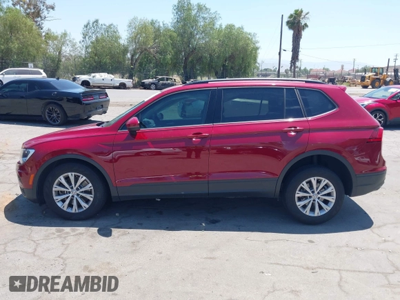 2018 Volkswagen Tiguan S with VIN 3VV1B7AX4JM043324, listed as a IAAI auction lot 42623550 with 62,858 mi miles and . Bid and sale history available at DreamBid. Image 14.