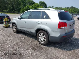 2013 Kia Sorento LX with VIN 5XYKT3A6XDG361675, listed as a IAAI auction lot 42402112 with 172,414 mi miles and . Bid and sale history available at DreamBid. Image 3.