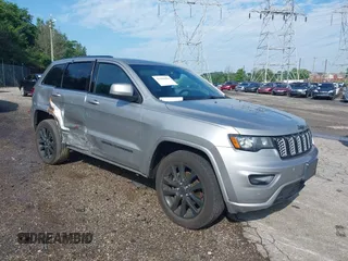 2018 Jeep Grand Cherokee Altitude with VIN 1C4RJFAGXJC103266, listed as a IAAI auction lot 42390481 with 89,283 mi miles and . Bid and sale history available at DreamBid. Image 1.