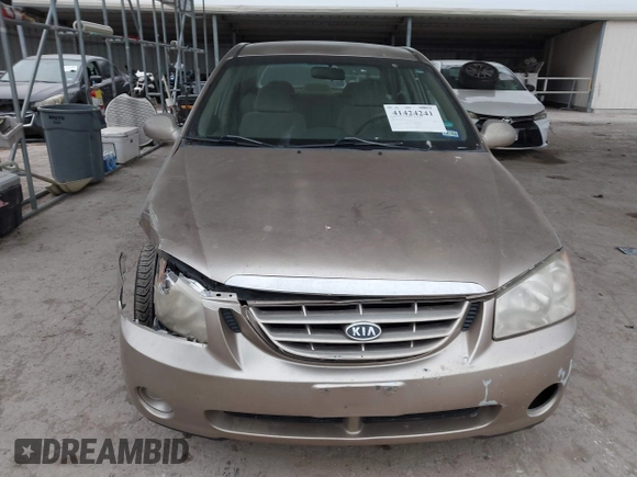 2004 Kia Spectra LX with VIN KNAFE121245064294, listed as a IAAI auction lot 41424241 with 110,136 mi miles. Bid and sale history available at carsss.com. Image 12.