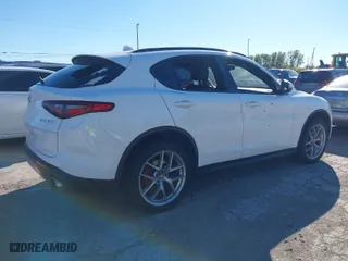 2018 Alfa Romeo Stelvio Ti Sport with VIN ZASFAKNN8J7B84353, listed as a IAAI auction lot 40483977 with 86,077 mi miles. Bid and sale history available at carsss.com. Image 4.