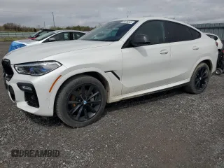 2020 BMW X6 xDrive40i z VIN 5UXCY6C09L9B58603, wystawiony jako Copart lot #55426845 z przebiegiem 74 540 mil mil oraz Szkoda całkowita • Salvage title. Historia ofert i sprzedaży dostępna na DreamBid. Obrazek 1.